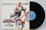 Front cover of Tequila by The Champs featuring Pee-Wee Herman riding a red bicycle