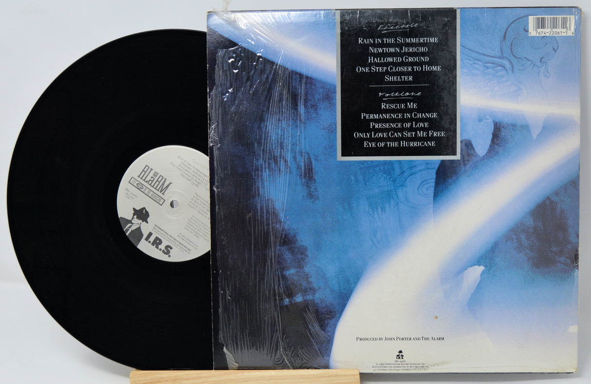 Vinyl record with its cover featuring a blue and white design.