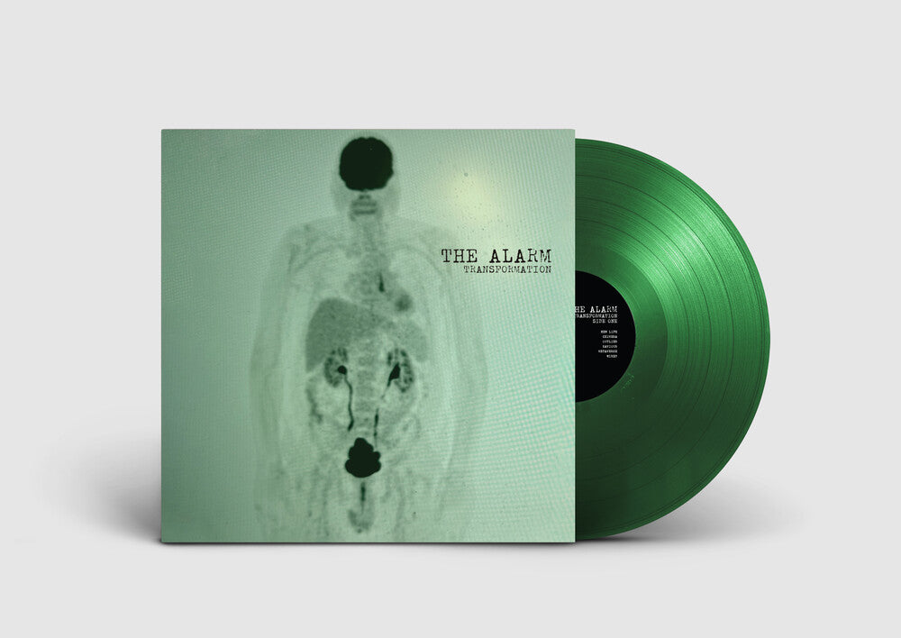 Vinyl record with green cover featuring a skeleton illustration on a light gray background