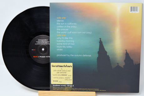 Back cover of The Autumn Defense Circles vinyl record with track listing and review quotes