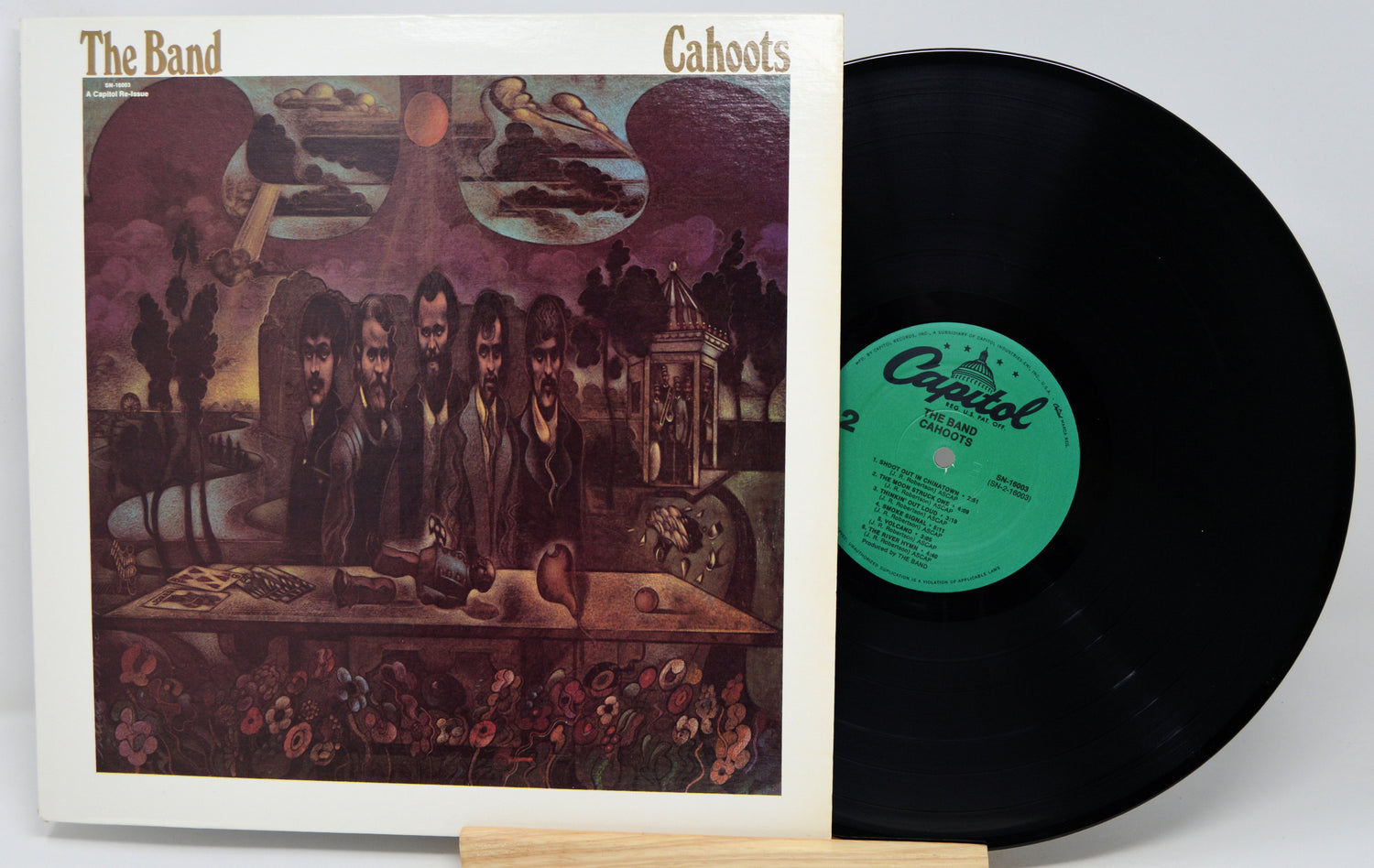 Vinyl record with cover featuring 'The Band' and 'Cahoots' on a white background