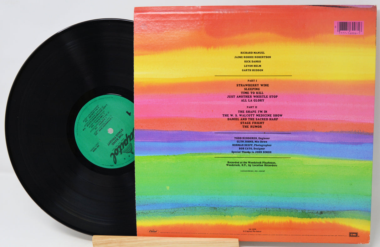 Vinyl record with a colorful rainbow-style cover