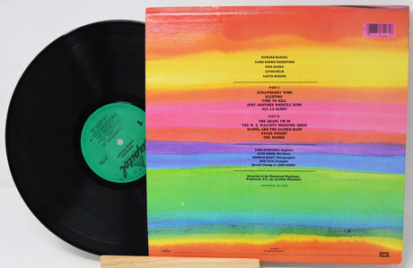 Vinyl record with a colorful rainbow-style cover