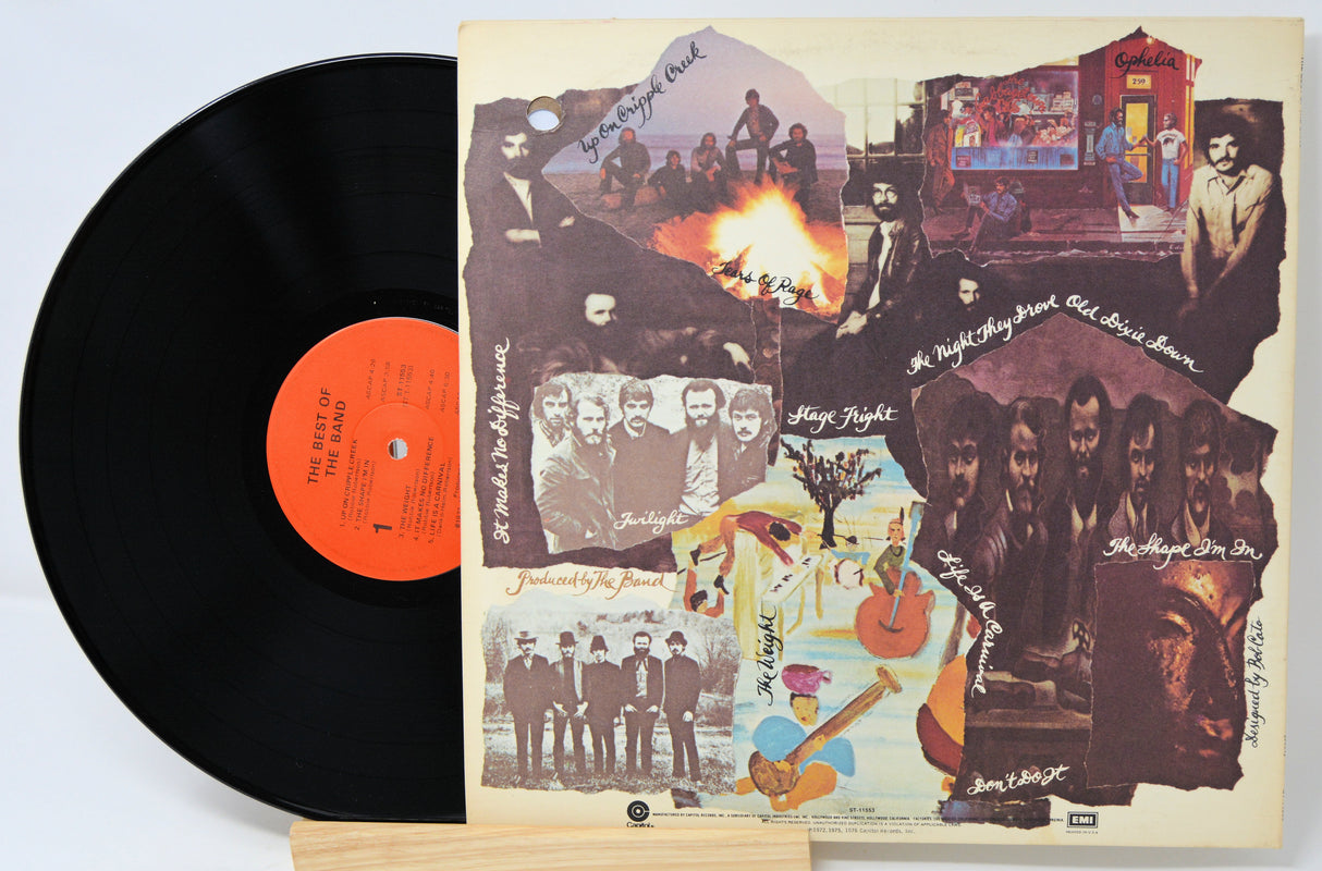 Vinyl record with a colorful album cover featuring band members and scenes.