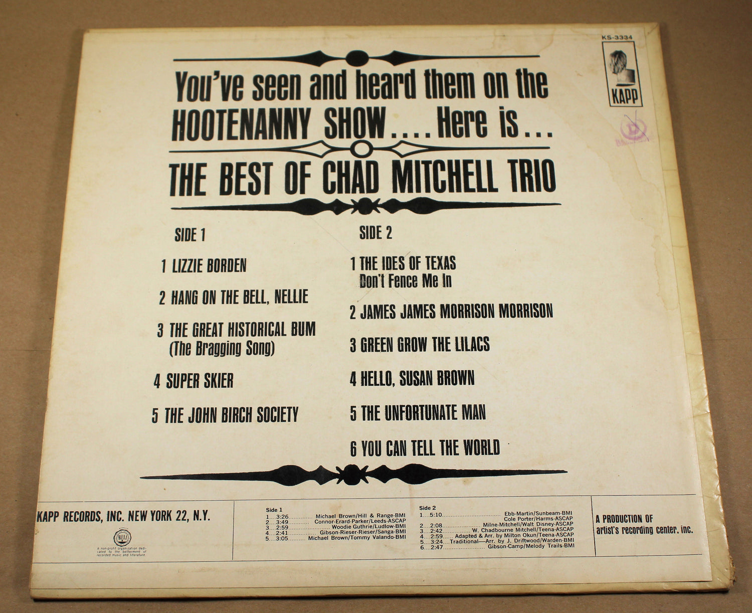 Back cover of The Best of Chad Mitchell Trio album showing tracklist and details