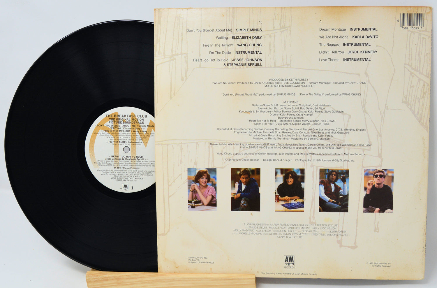 Vinyl record with colorful sleeve on a white background