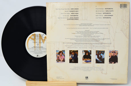Vinyl record with colorful sleeve on a white background
