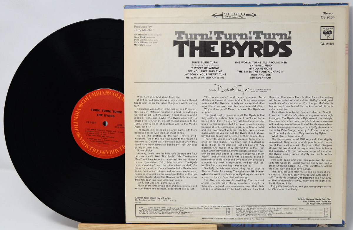 The Byrds 'Turn Turn Turn' vinyl record LP with the black record partially visible behind the printed back cover, photographed on a white background.
