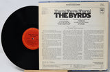 The Byrds 'Turn Turn Turn' vinyl record LP with the black record partially visible behind the printed back cover, photographed on a white background.