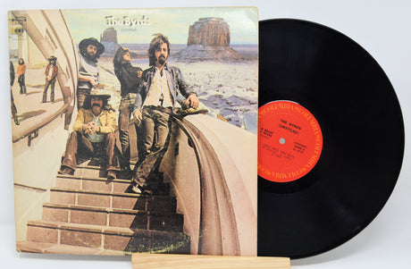A used vinyl record of The Byrds titled 'Untitled' with the band members on the cover, and the vinyl record displayed to the right.