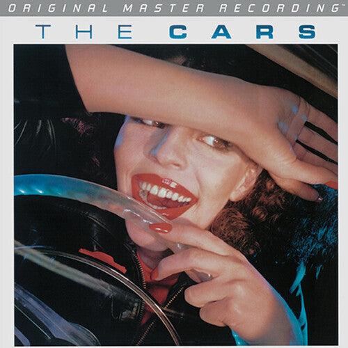 Album cover with a person holding a vinyl record and a hand reaching out, featuring 'The Cars' branding.