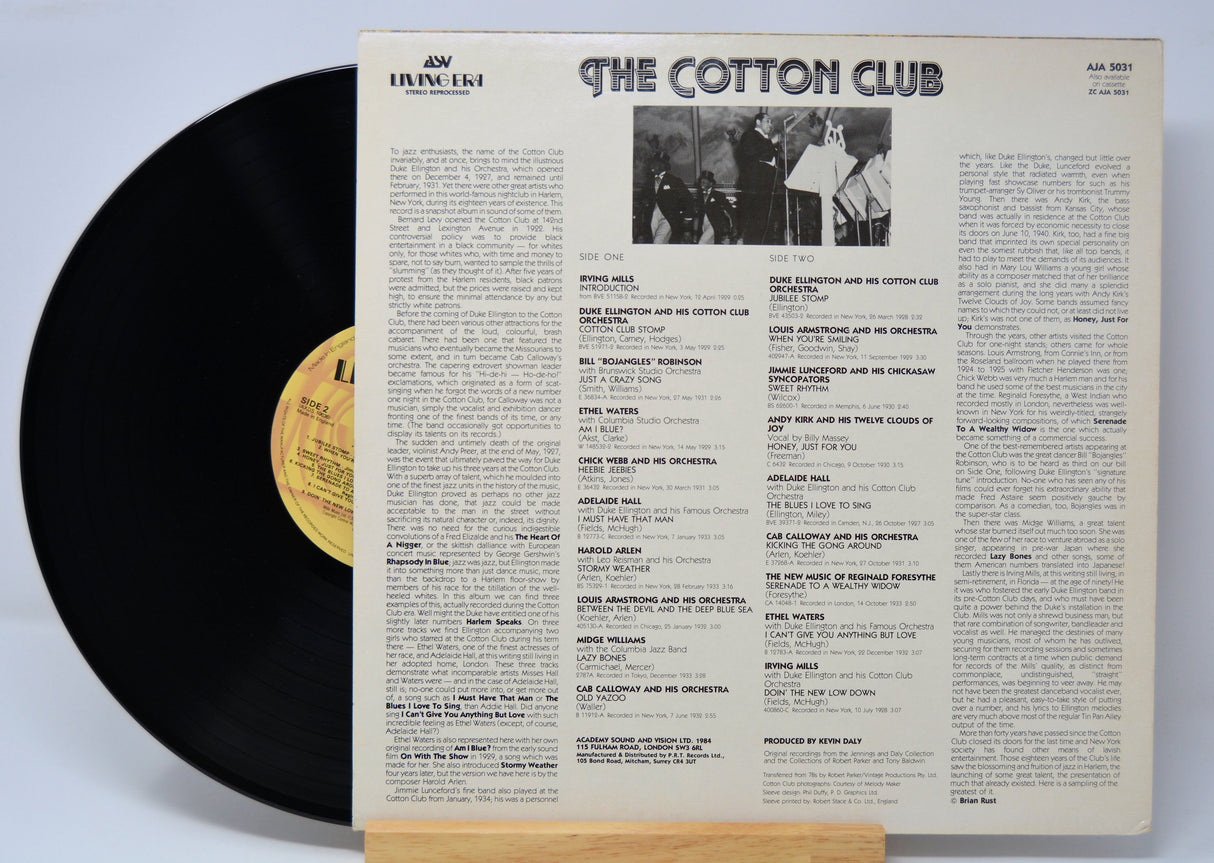 Vinyl record with 'The Cotton Club' album back cover on a white background
