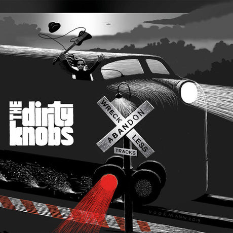Album cover with a car, traffic light, and crossroads sign, featuring the text 'The Dirty Knobs'.