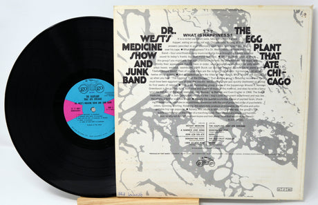 Back cover and vinyl record of The Eggplant That Ate Chicago by Dr. West's Medicine Show and Junk Band, showing album details