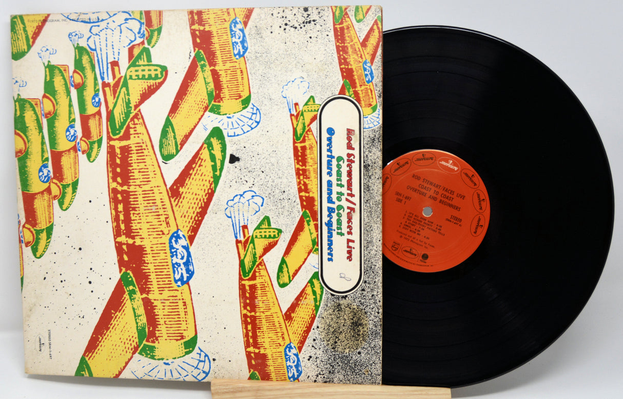 Vinyl record with a colorful cover featuring abstract designs.
