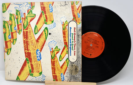 Vinyl record with a colorful cover featuring abstract designs.