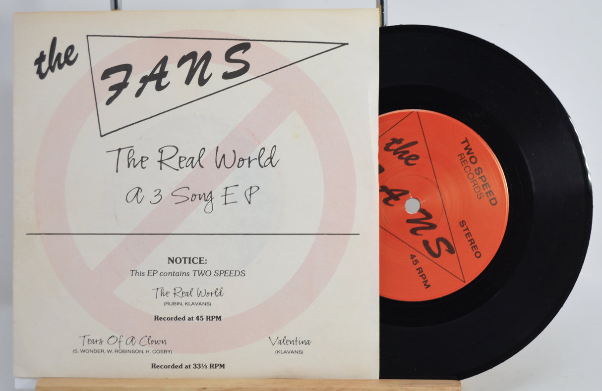 Vinyl record and cover with 'the FANS' branding on a white background