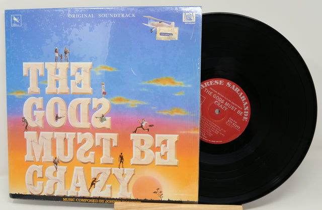 Front cover and vinyl record of The Gods Must Be Crazy original soundtrack with colorful illustrated artwork