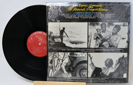 Back cover and vinyl record of The Gods Must Be Crazy original soundtrack with vintage black and white film stills
