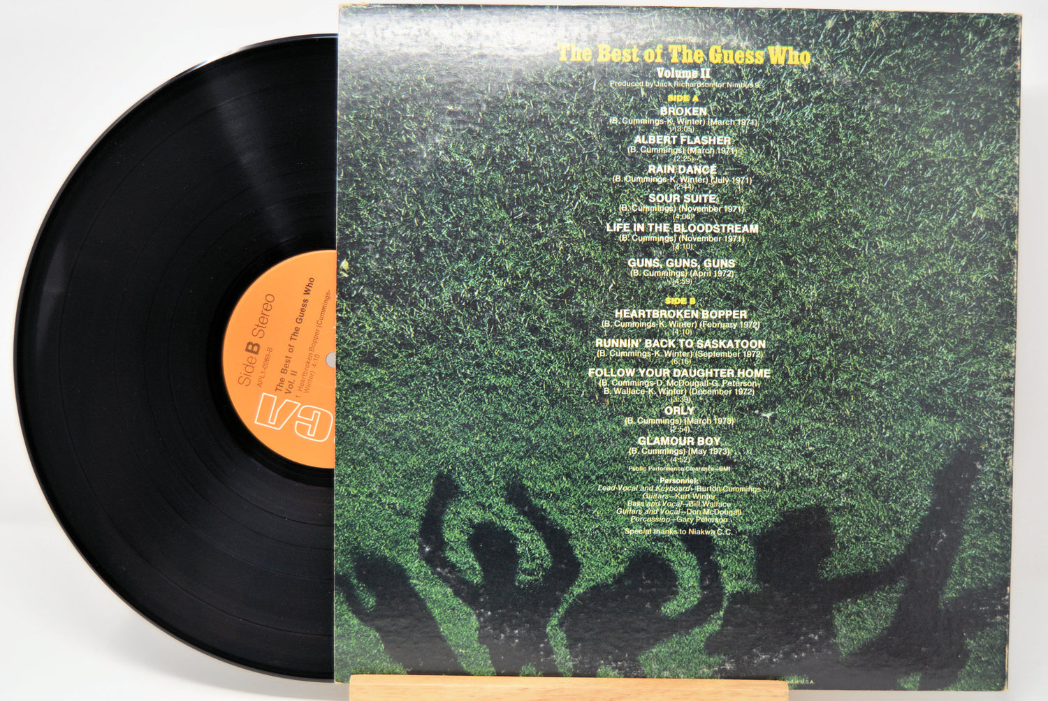 'The Guess Who - Best Of Vol II' Vinyl record with green textured cover featuring album tracklist and album art.