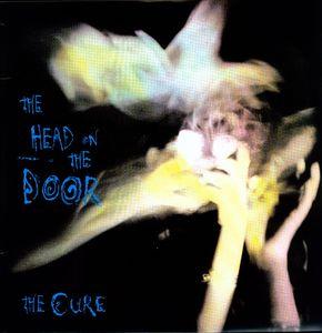 The Cure The Head on the Door album cover featuring abstract hands and vibrant colors