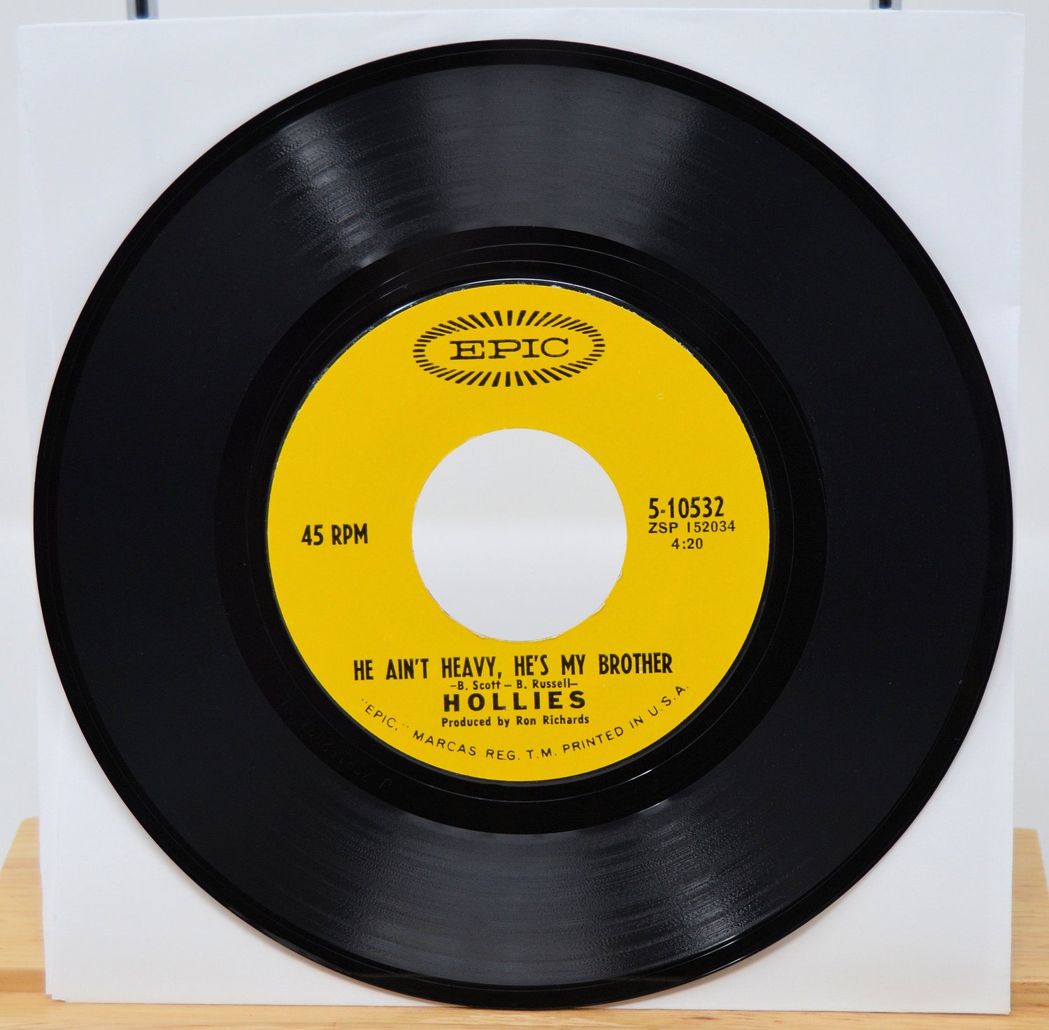 Epic 45 RPM vinyl record featuring The Hollies' He Ain't Heavy, He's My Brother single