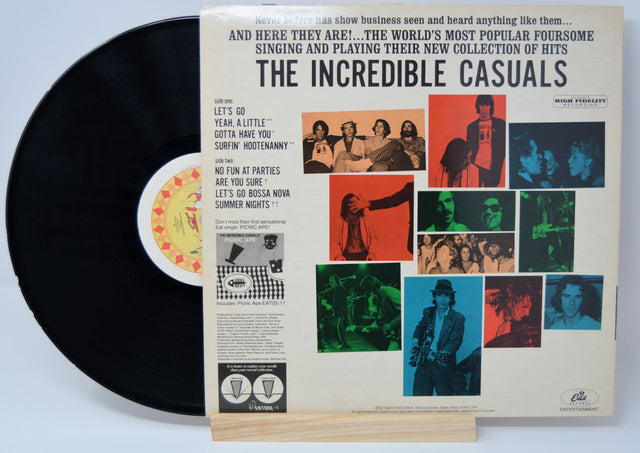 Back cover of The Incredible Casuals Let's Go! maxi-EP vinyl showing tracklist and band photos