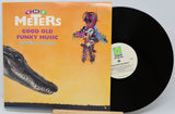Vinyl record with colorful cover featuring an alligator and abstract design, titled 'Good Old Funky Music' by The Meters.