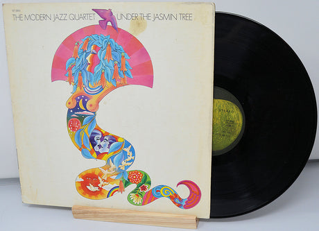 Front cover of 'Under the Jasmin Tree' LP by The Modern Jazz Quartet with colorful psychedelic artwork