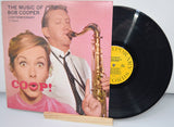 Front album cover of The Music of Bob Cooper vinyl record featuring a woman and saxophonist
