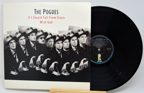 Vinyl record and cover of 'The Pogues' album 'If I Should Fall from Grace With God' on a white background