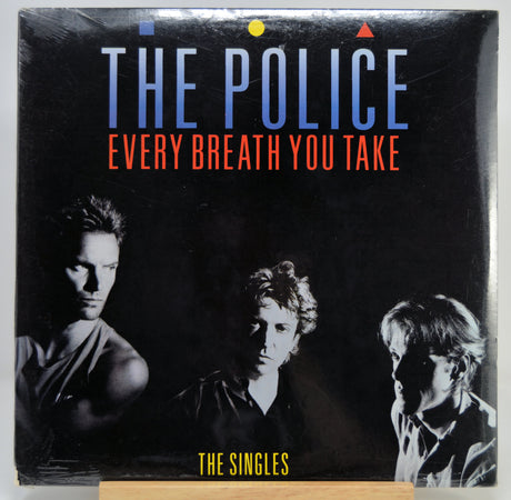 The Police 'Every Breath You Take' vinyl single cover, showing the band members in black-and-white portraits on a black background with blue and orange text.
