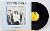A used vinyl record of The Pretenders - Extended Play with a black vinyl record and a cover featuring a black and white photo of the band members.