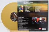 Back cover and gold vinyl of The Sheila Divine's New Parade album, tracklist and band details shown