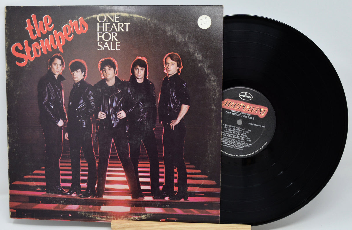 Vinyl record and cover of 'One Heart for Sale' by The Stompers on a white background