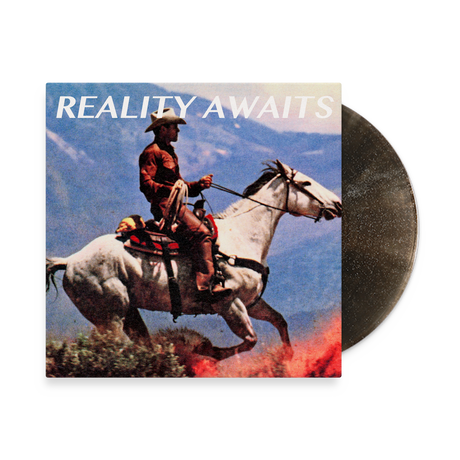 Vinyl record by The Strokes with a cover featuring a cowboy on a horse and 'Reality Awaits' text.