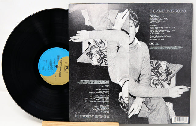 Back cover of The Velvet Underground self-titled vinyl LP with track list and black and white portrait art