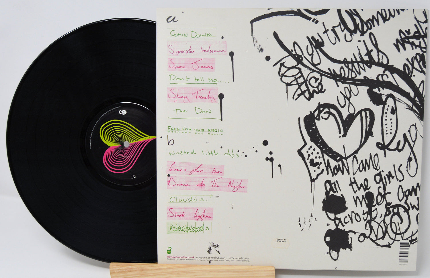 Back cover and vinyl record of The View's 'Hats Off to the Buskers' LP showing tracklist and artwork