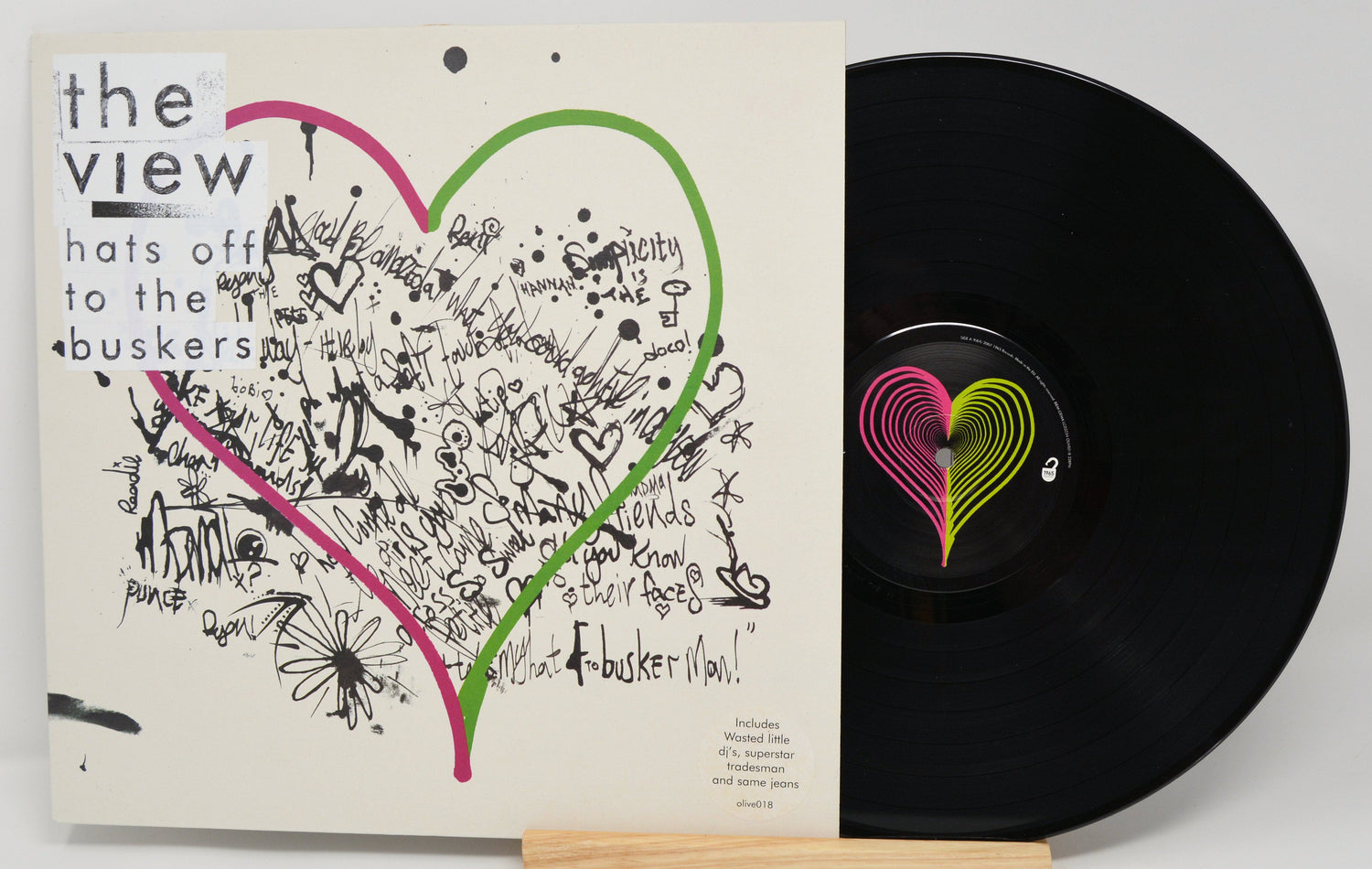 Front cover and vinyl record of The View's 'Hats Off to the Buskers' LP with heart-themed graffiti art