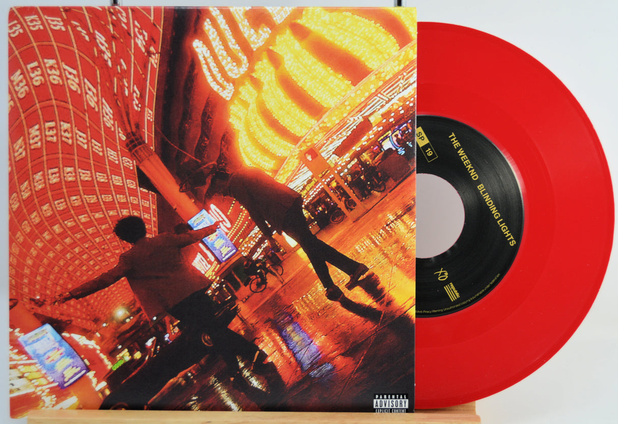 The Weeknd Red vinyl record with a colorful front cover featuring a dancer and illuminated building.