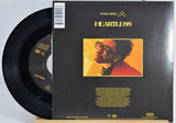 The Weeknd 7 Inch Vinyl record for 'Heartless' back cover featuring a person with glasses on a yellow background.