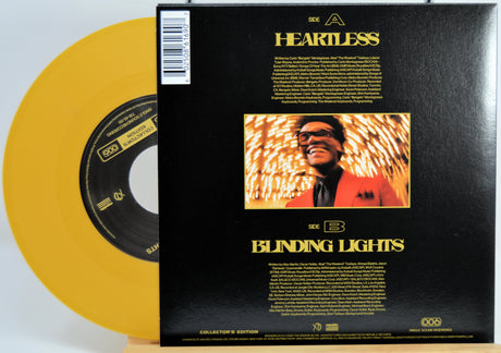 The Weekend Heartless variant #5 7 Inch Vinyl record with a black back cover featuring a person wearing sunglasses and a red jacket, and a yellow record inside.