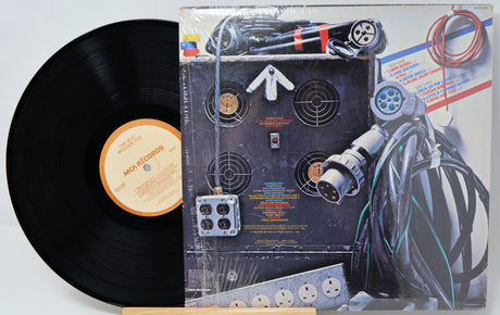 Vinyl record with a detailed cover featuring mechanical designs.