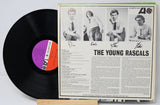 Back cover and vinyl record of The Young Rascals original album featuring tracklist and band photos