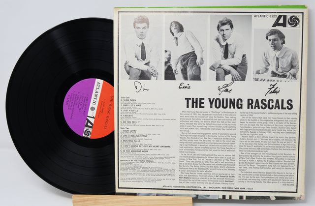 Back cover and vinyl record of The Young Rascals original album featuring tracklist and band photos