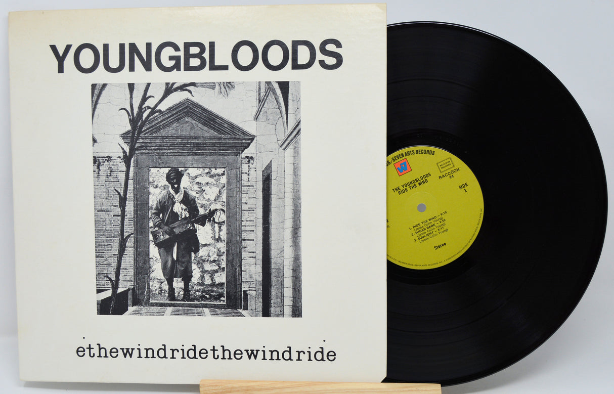 Vinyl record and cover with 'Youngbloods' album art on a white background