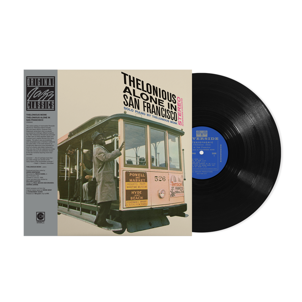 Vinyl record with cover featuring a trolley and person, labeled 'Thelonious Alone in San Francisco'.