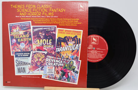 Front cover of vinyl record Themes from Classic Science Fiction, Fantasy and Horror Films featuring vintage movie posters