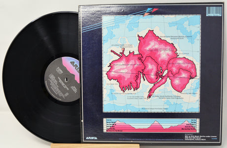 Vinyl record with a colorful cover featuring pink abstract designs on a white background