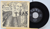 Vinyl record with cover featuring a stylized illustration of a person and text.